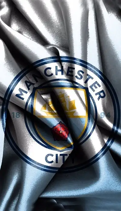 Manchester City signe